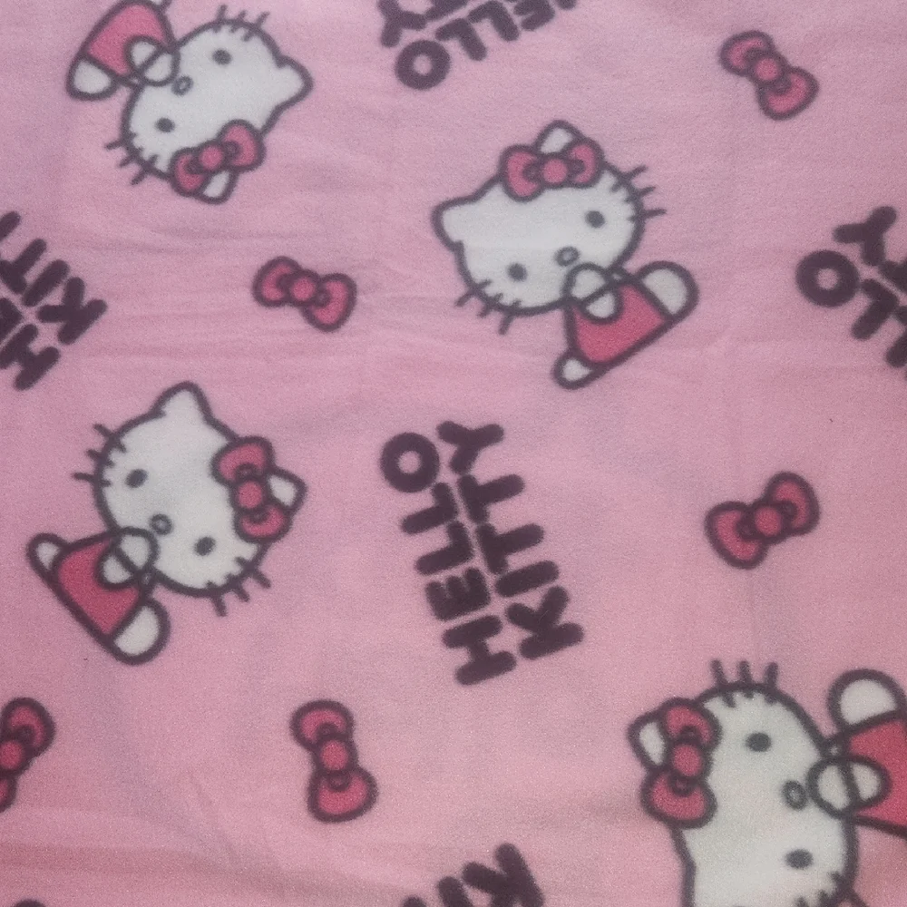 Hello Kitty Pink Fleece Tie-Blanket with Bow Graphic